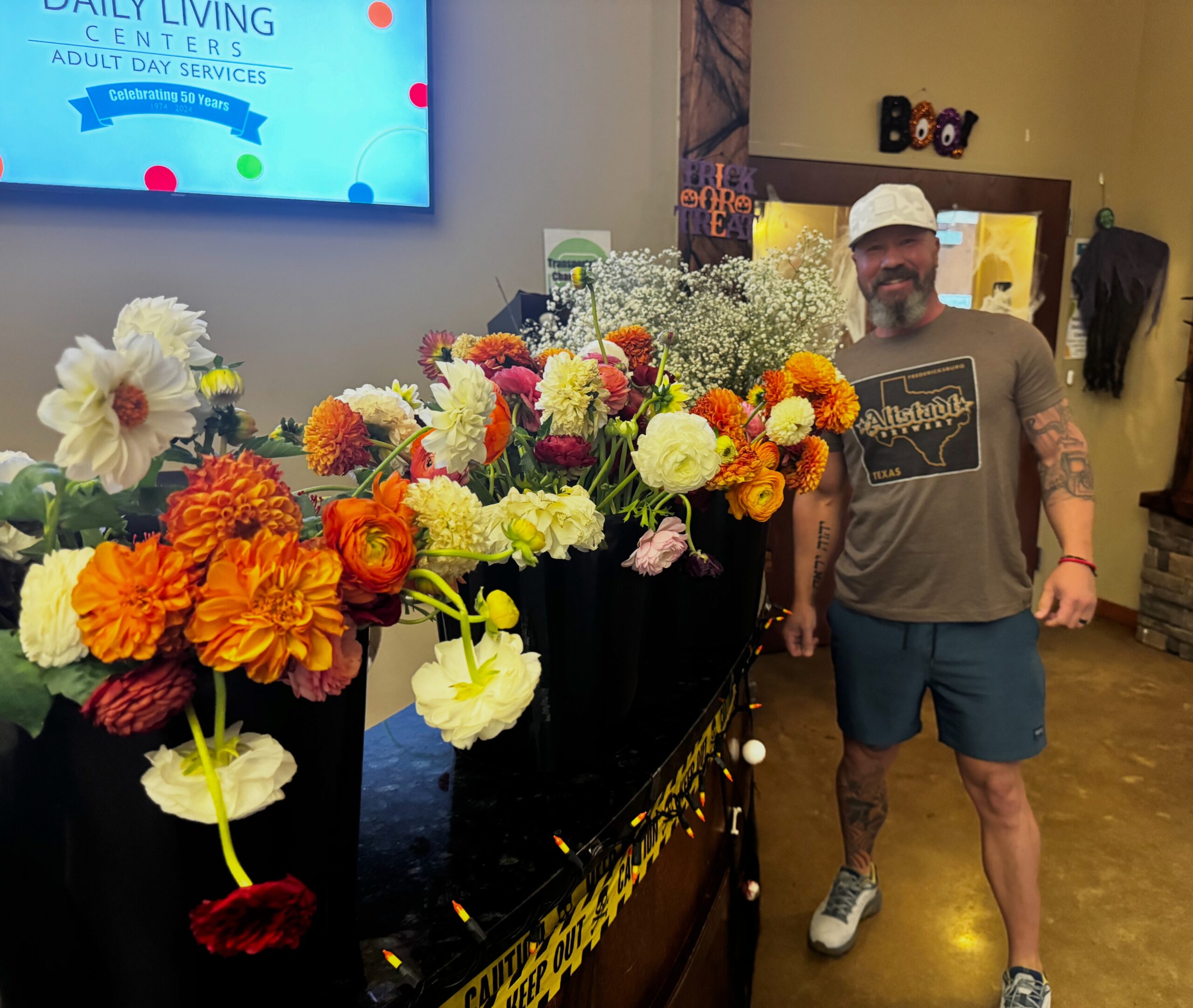 Petals of Light volunteer delivering flowers